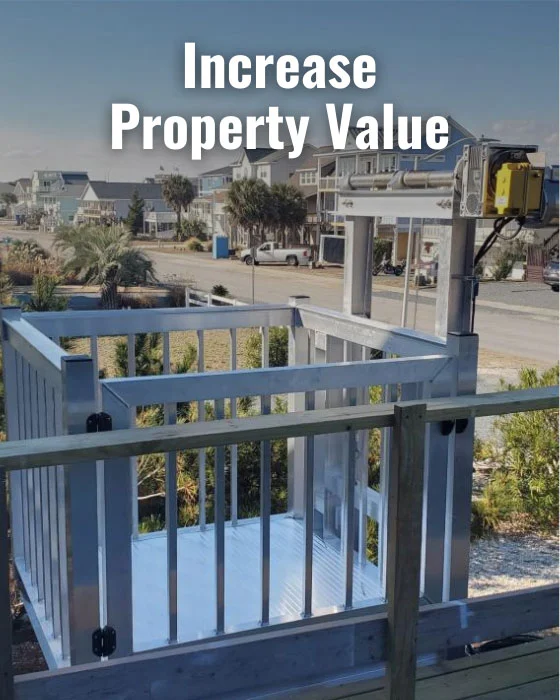 Outdoor home elevators enhance property value in a coastal neighborhood, with clear skies and palm trees in the background.